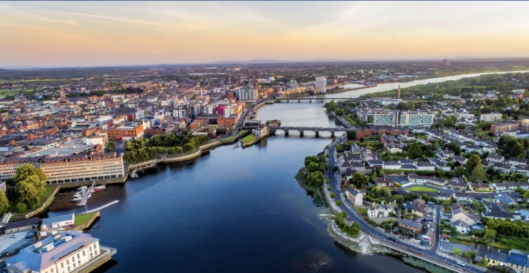 Aerial view of Limerick city and the River Shannon at sunset